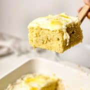 Slice of lemon cake on a cake server.
