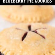 Blueberry cookies with some of the filling oozing out a little on the side.