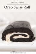 A close-up of a sliced Oreo Swiss roll with a creamy white filling and dark chocolate cookie exterior, shown on a white surface. Text above reads Oreo Swiss Roll and below by thebuttercookie.com.